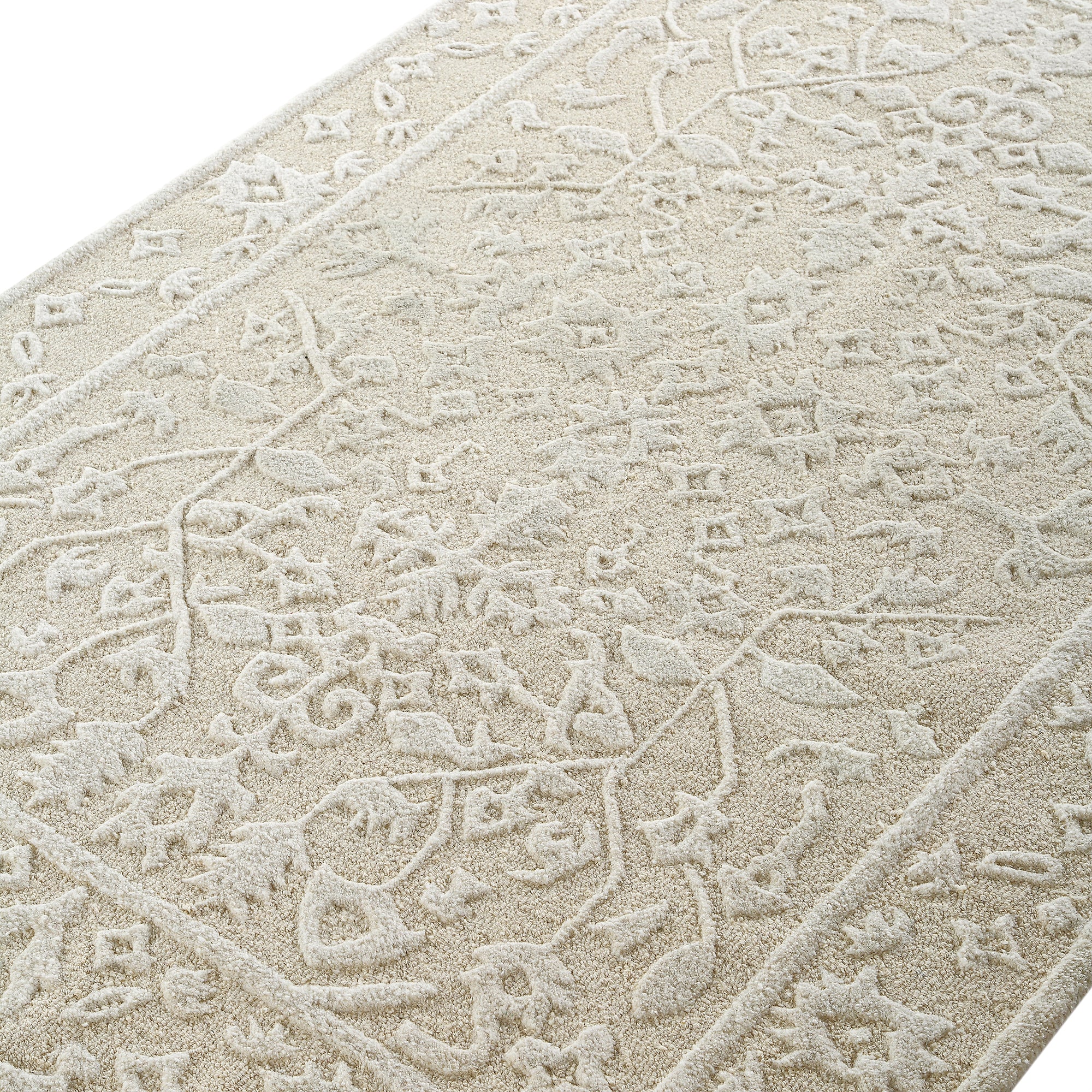 Lourdes Hand Tufted and Textured Cream Wool Rug